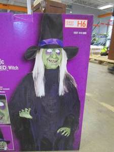 lot 227 image: HOME ACCENTS HOLIDAY 6 ft Animated Standing Witch Halloween Animatronic (APPEARS TO BE BRAND NEW IN BOX)