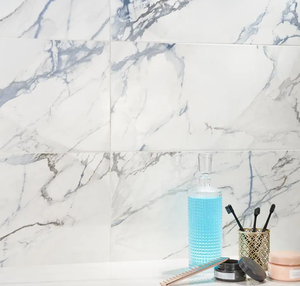 lot 228 image: Calacatta Indigo 12 in. x 24 in. Polished Porcelain Floor and Wall Tile (6-Piece, 11.62 sq. ft.Case) (10 CASES TOTAL, APPROXIMATELY 116 SQ FT TOTAL)