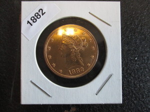 1. 1882 Liberty Gold Eagle designed by Christian Gobrecht - One Half-Ounce of Gold -  carded and labelled.