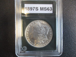 3. 1897 S Morgan Silver Dollar - Slabbed in Protective Case.