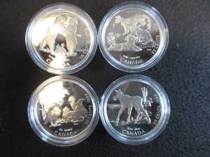 4. 1996 Royal Canadian Mints Discovering Nature Series. 4-coin set features a Moose Calf, Ducklings, Cougar kittens, and Bear Cubs.