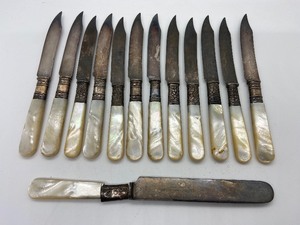 lot 233 image: Vintage Mother of Pearl and Sterling Silver Banded Table Knives