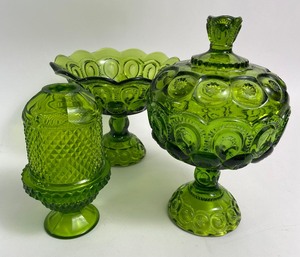 lot 186 image: Gorgeous Green Carnival Glass Items - Candy Bowl, Covered Candy Dish and Candle Holder