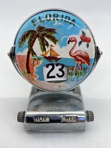 lot 99 image: Vintage Perpetual Flip Calendar - Florida & Hawaii Mug