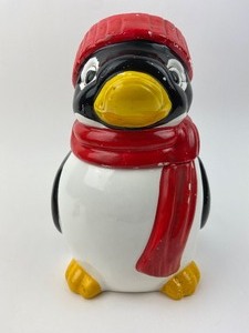 lot 258 image: Vintage Penguin Cookie Jar, Mr. & Mrs. Claus SP Shakers and a Santa Mug