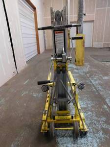 lot 8 image: Sumner 2416 Push Around Hand Crank Material Lift