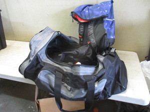 lot 98 image: Large Duffel full of smaller bags