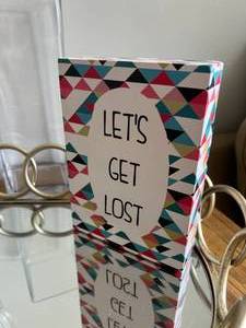 Gold Mirror, Sign and Champagne Glasses