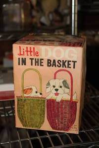 lot 600 image: Vintage Little Dog In The Basket Toy