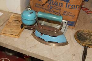 lot 836 image: Vintage Coleman 4A Self-Heating Iron