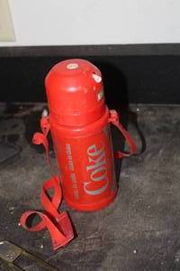 lot 913 image: Coca-Cola Thermos w Strap