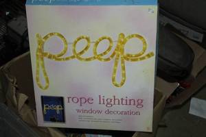 lot 707 image: Peep Rope Lighting Window Decoration (in original packaging)