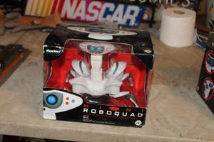 lot 682 image: Mini Roboquad Robot (in original packaging)