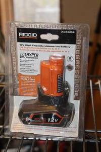 lot 892 image: Ridgid 12VDC Cordless Tool High Capacity Lithium Ion Battery (in original packaging)