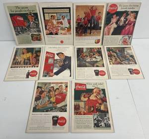 lot 93 image: Group Of Vintage Coca-Cola Ads In Plastic