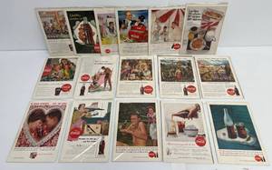 lot 96 image: Group Of Vintage Coca-Cola Ads In Plastic