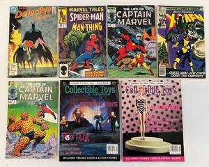 lot 103 image: Group Of Vintage Comics  Including Merry Christmas X-men 50 Cent, Detective Comics And More