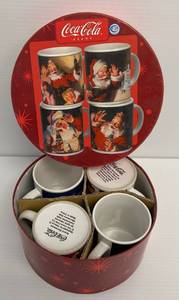 lot 107 image: 2002 Coca-Cola Holiday Portraits Plates Set Of Four Sotneware Mugs