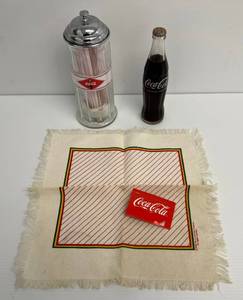 lot 112 image: Group Of Coca-Cola Items Including Coca-Cola Bottle With Chinese Writing, Straw Holder And Kitchen Towel