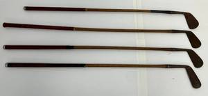 lot 142 image: Four Antique Wooden Golf Clubs