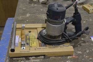 lot 38 image: Bosch 1618 double demountable hinge router setup