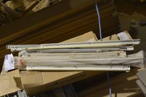 lot 42 image: various white drawer slides