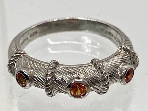 lot 56 image: Orange Colored Cubic Zirconia and Sterling Judith Ripka Ring