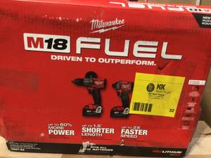 lot 32 image: Milwaukee M18 FUEL 18V Lithium-Ion Brushless Cordless Hammer Drill and Impact Driver Combo Kit (2-Tool) with 2 Batteries Customer Returns See Terms on Auction