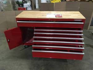 lot 6 image: Husky 61 in. W x 22.1 in D Standard Duty 7-Drawer 1-Door Mobile Workbench Tool Chest with Solid Wood Top in Gloss Red Customer Returns  Review all pictures