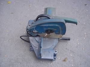 lot 20 image: Vintage 19 Electric miter saw...