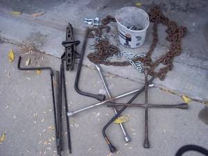 lot 25 image: Assortment of tire irons, four-way ...