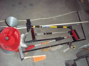 lot 79 image: Squeegee, bucket, funnels and snow ...