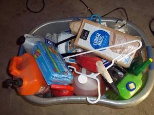 lot 309 image: laundry basket overflowing with hou...