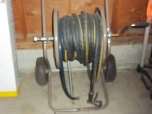 lot 330 image: Heavy duty hose reel with a hose...