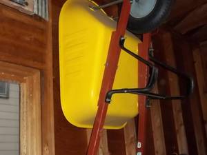 lot 335 image: Yellow wheel barrow in good conditi...
