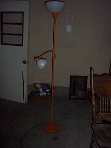 lot 340 image: Orange decorative floor lamp...