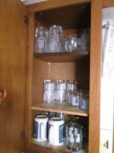 lot 469 image: Content of smaller upper cupboard t...