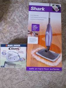 lot 510 image: Both new in boxes a Shark Swivel st...