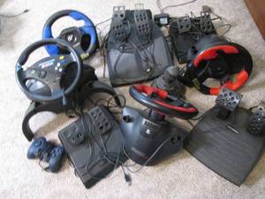 lot 516 image: Assortment of steering wheels and f...
