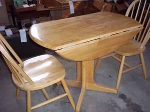 lot 394 image: Wood drop leaf table with two chair...
