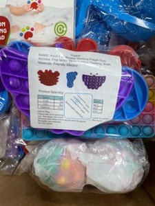 lot 60 image: Assortment of New silicone push pop fidget toys