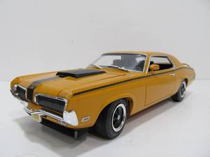 lot 21 image: Diecast Metal Mercury Cougar - Orange