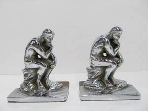 lot 38 image: Mid Century Cast AluminumChrome Thinker Bookends