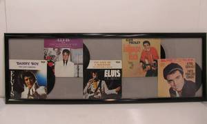 lot 45 image: Framed Group of ELVIS Vinyl 45 Records