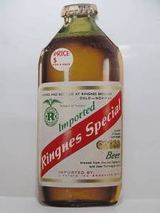 lot 69 image: Large Vintage Ringnes Special Diecut Cardboard Beer Bottle Advertising Sign