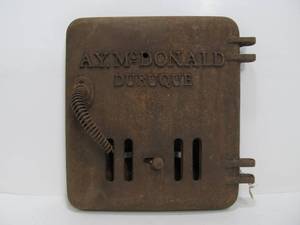 lot 207 image: Antique Cast Iron A.Y. Mcdonald Cast Iron Furnace Door