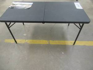 lot 507 image: Mainstays 4 Fold-in-Half Rectangular,  Height Adjustable Folding Table, Rich Black 48 W x 24 D x 21.14 - 28.03 H, Scratch and Dent - SOLD AS IS