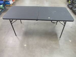 lot 508 image: Mainstays 6 Foot Bi-Fold Plastic Folding Table, Black 72 W x 30 D x 29 H - Scratch and Dent, SOLD AS IS