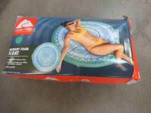 lot 590 image: Ozark Trail Lake Float Lounger No Inflate Memory Foam Blue White and Teal Adult Unisex, Size 48 x 48 x 1.75 thickness - SOLD AS IS