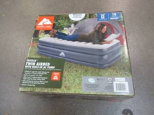 lot 594 image: Ozark Trail Tritech QuadComfort 18 Air Mattress Antimicrobial Coating with Built-in AC Pump, Twin - SOLD AS IS